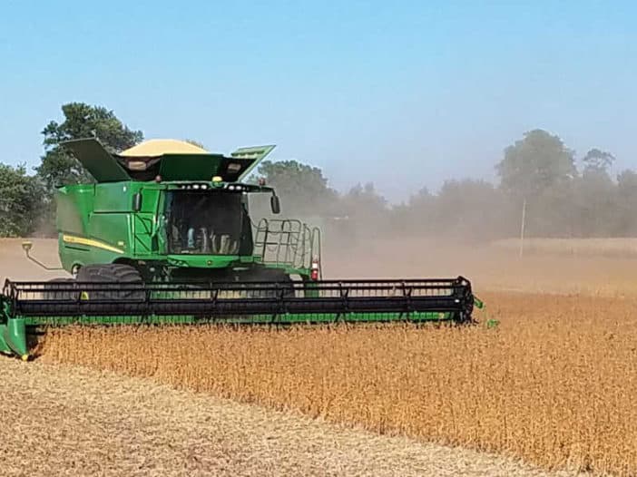 John Deere Combine Soybeans in Action for Field